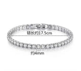 Silver bracelet with clear stones on a white background