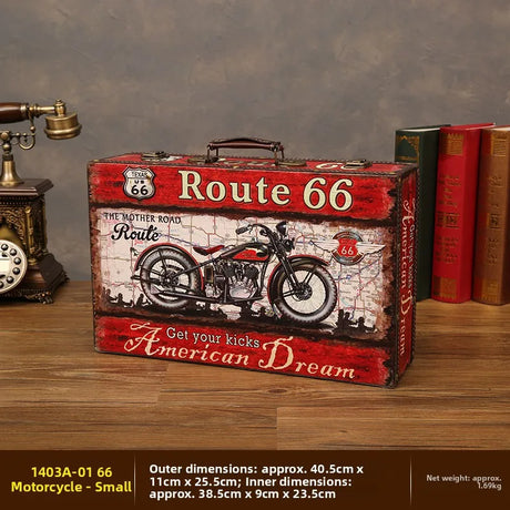 Vintage-style suitcase with Route 66 and motorcycle design on a wooden surface.
