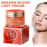 Dragon Blood Lady Cream with packaging and a woman's face with water droplets.