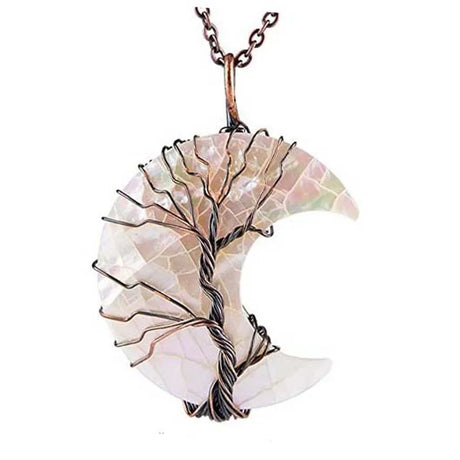 Decorative crescent moon pendant with tree design on a white background