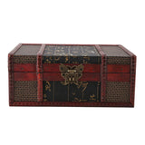 Decorative wooden box with intricate designs and a brass lock on a white background