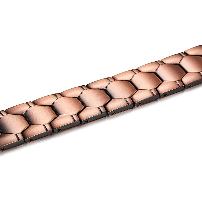 Rose gold bracelet with a honeycomb pattern on a white background