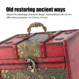 Vintage-style red and gold trunk with intricate designs and text about restoring ancient ways.