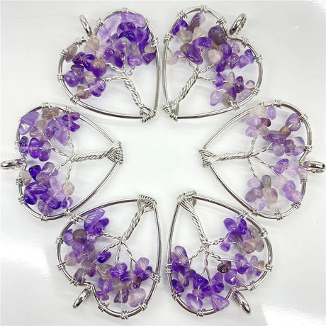 Five heart-shaped purple gemstone pendants on a white background