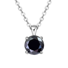 Necklace with a black gemstone pendant on a white background