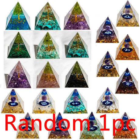 Collection of pyramid-shaped orgone crystals with different colored stones and symbols on a white background.