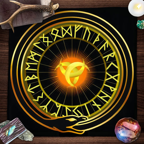 Decorative cloth with Runes design on a wooden surface with crystals and a candle.