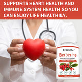 Person holding a red heart with a dietary supplement bottle labeled 'Fearathe Berberine' on a white background.