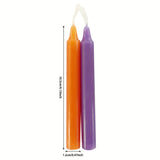 Two candles, one orange and one purple, with measurements on a white background