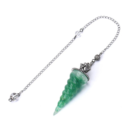 Green crystal pendant on a chain with a white background
