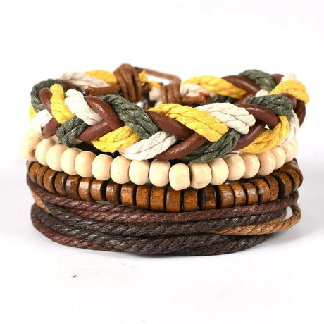 Stack of braided bracelets with wooden beads on a white background