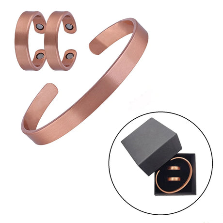 Rose gold bracelet with magnetic stones on a white background, showing a close-up of the bracelet in a box.