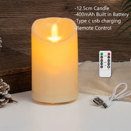 Flickering candle with remote control and USB cable on a wooden background