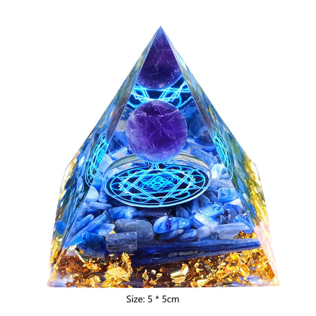 Crystal pyramid with blue and purple stones on a white background