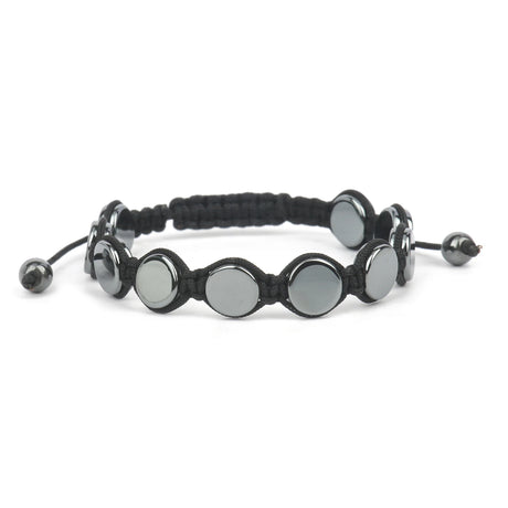 Black bracelet with silver circular beads on a white background