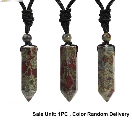 Three stone pendant necklaces on black cords with a white background