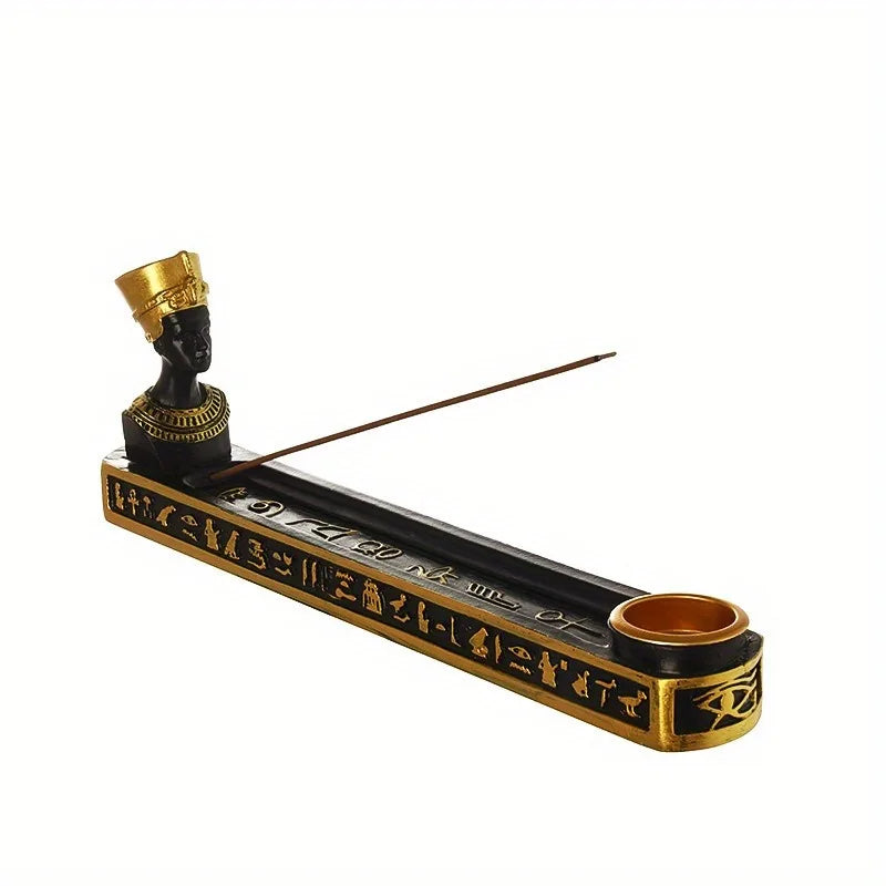 Decorative incense burner with hieroglyphics on a white background