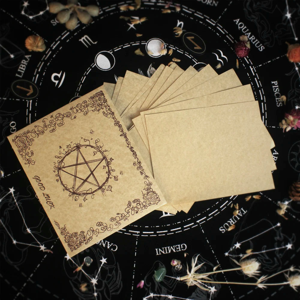 Set of tarot cards with a pentagram design on a starry night sky background.