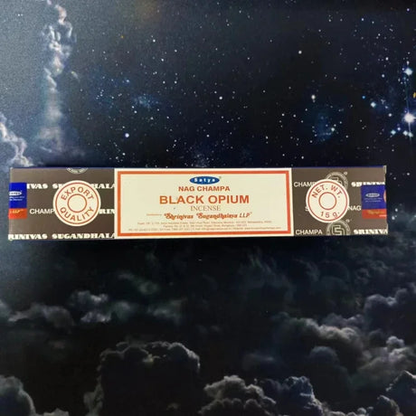 Box of Nag Champa Black Opium incense against a space-themed background