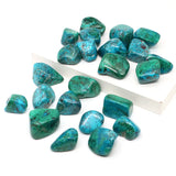 Turquoise stones on a white background