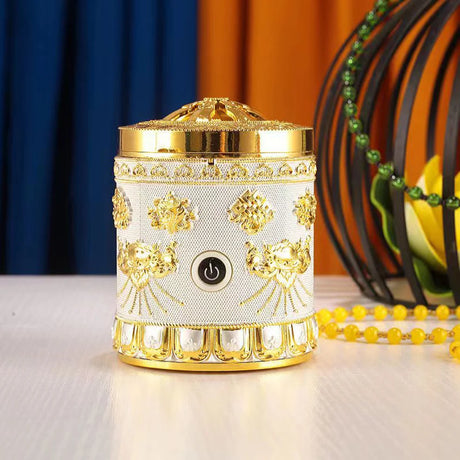 Decorative white and gold lamp with power button on a table