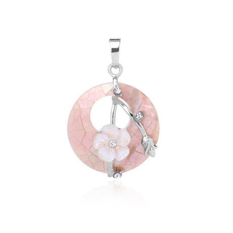 Pink circular pendant with floral design on a white background