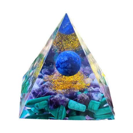Pyramid-shaped decorative item with blue spheres, gold glitter, and teal elements on a white background
