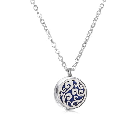 Silver necklace with a round pendant featuring blue and white patterns on a white background