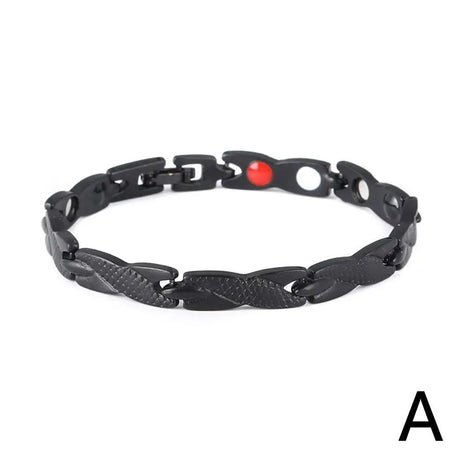 Black chain bracelet with a red bead on a white background
