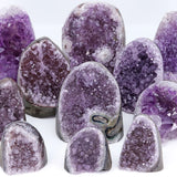 Amethyst geodes on a white background
