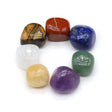 Set of colorful tumbled stones on a white background