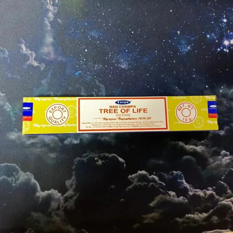 Box of Tree of Life incense against a cosmic background
