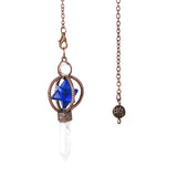 Necklace with blue crystal and white stone pendant on a white background