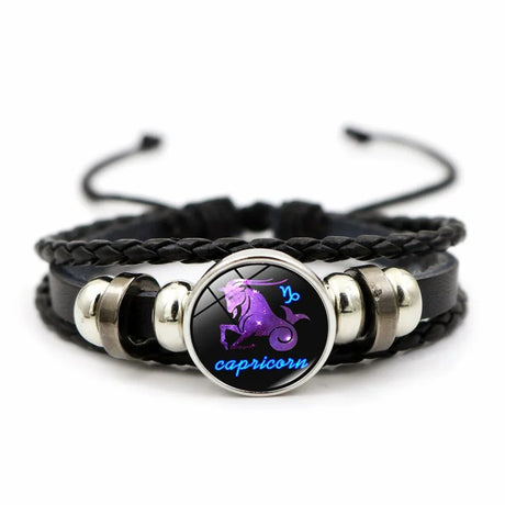 Bracelet with Capricorn zodiac symbol on a black braided strap
