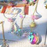 Colorful crystal necklace on a book with a soft focus background