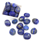 Blue marbled stones with a white box on a white background