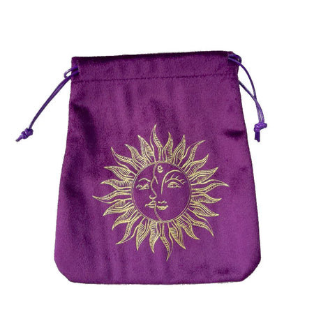 Purple drawstring bag with a gold sun design on a white background
