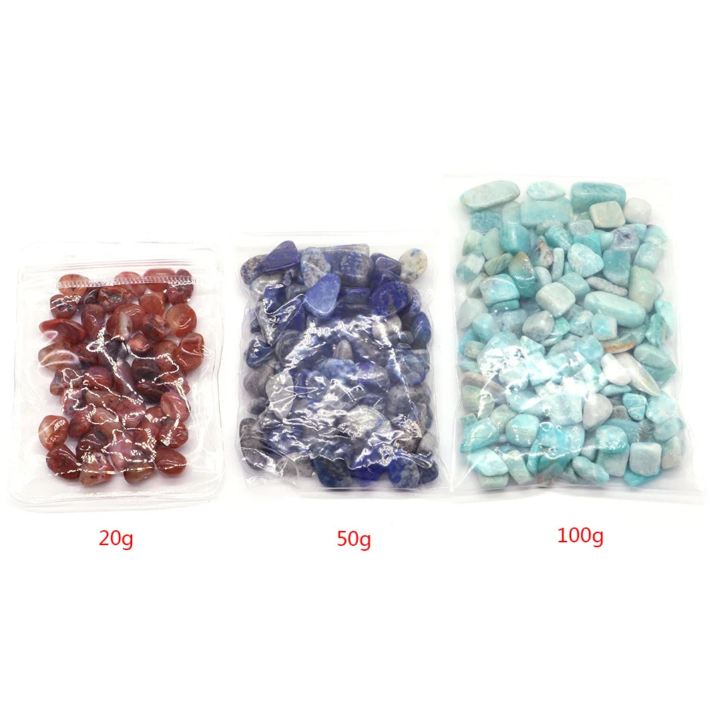 Three bags of different colored stones with weight labels on a white background