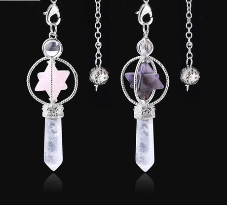 Crystal pendant necklaces with star-shaped ends on a black background, branded as 'Cilia'.