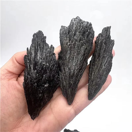 Three pieces of black stone.