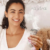 Woman holding a product with 'Age of Sage' branding in a soft, blurred background