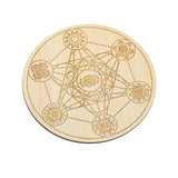 Wooden coaster with geometric design on a white background