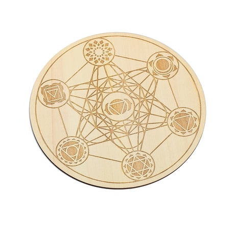Wooden coaster with geometric design on a white background
