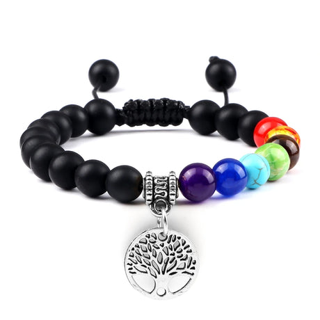 Black beaded bracelet with colorful beads and a tree of life charm on a white background
