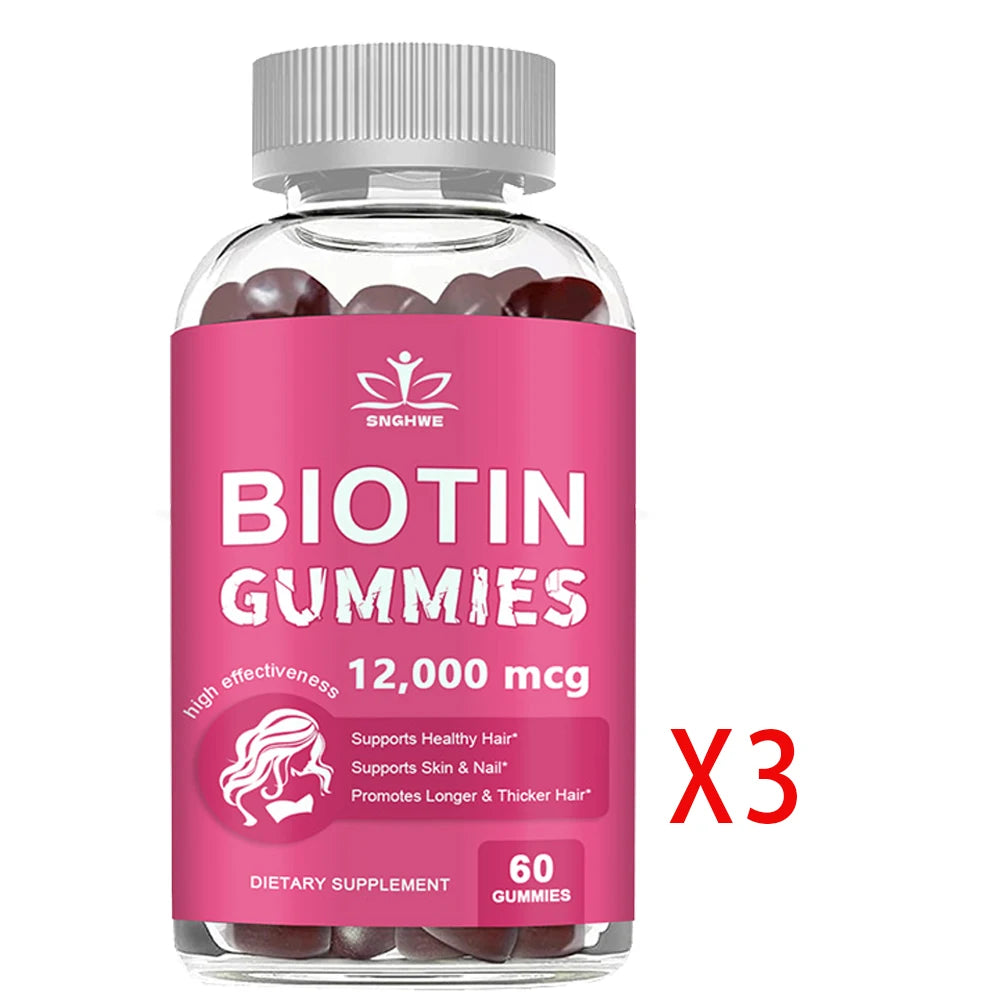 Bottle of biotin gummies with pink label and clear container on white background
