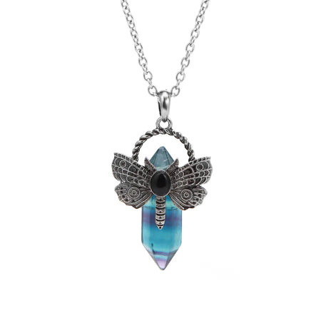 Dragonfly pendant necklace with blue crystal on a white background