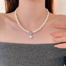 Pearl & Zircon Water-Drop Pendant necklace lifestyle image showing the pendant for elegant and dressy wear.