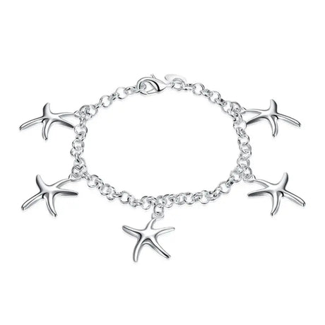 Silver bracelet with starfish charms on a white background
