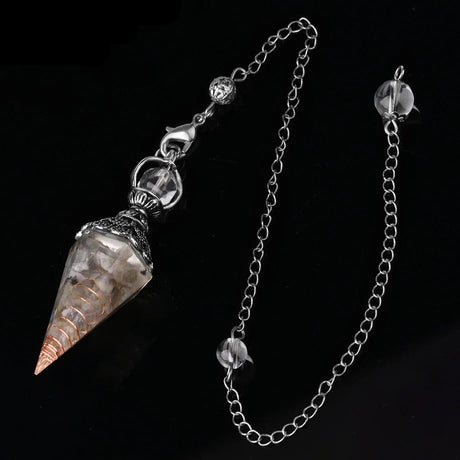 Silver pendant with chain on a black background