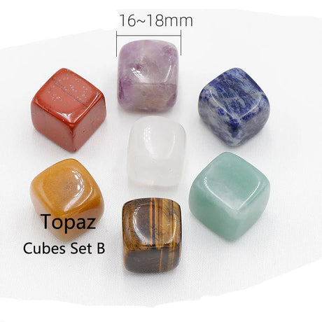Set of colorful topaz cubes with size indication on a white background